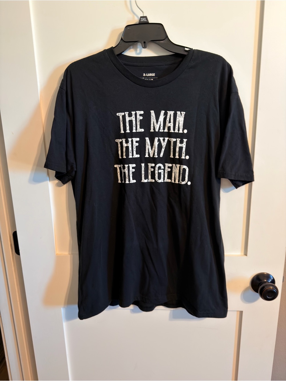 Black Short-Sleeve Graphic Tee — 'The Man. The Myth. The Legend.'